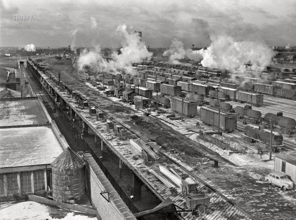 Photo showing: Blue Island Yard -- January 1943. Riverdale, Illinois. Blue Island Yard of the Indiana Harbor Belt Railroad with view of the icing platform.
