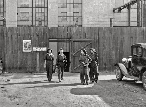 Photo showing: King Cobra vs. Wee Willie -- March 1943. San Bernardino, California. Women workers employed at the Santa Fe Railroad shops.