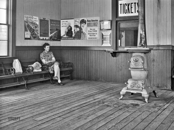Photo showing: TICKETS -- April 1943. San Augustine, Texas. Story of a small town. Waiting room in the railroad station.