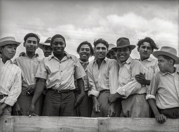 Photo showing: Los Braceros -- May 1943. Corpus Christi, Texas. Truckload of Mexican and Negro farm laborers.