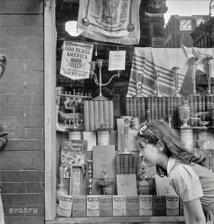 Photo showing: Romance of a People -- August 1942. New York. Window of a Jewish religious shop on Broome Street.