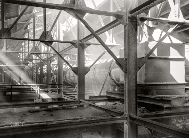 Photo showing: Roast Ducts -- September 1942. Deer Lodge County, Montana. Anaconda Smelter. Flues atop the battery of roasting furnaces.