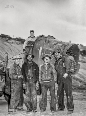 Photo showing: Junior Scrapper -- October 1942. Butte, Montana. 'Salvage for Victory.' Truck crew on scrap salvage day.