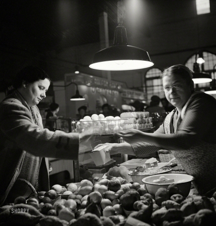 Photo showing: The Invisible Hand -- November 1942. At the Central Market in Lancaster, Pennsylvania.