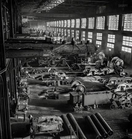 Photo showing: Gotterdammerung -- December 1942. Chicago, Illinois. Chicago & North Western Railroad locomotive repair shops. 