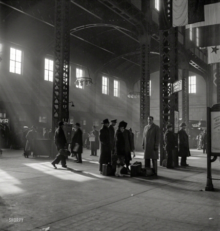 Photo showing: Way Station -- January 1943. Chicago, Illinois. Waiting for trains in the concourse of the Union Station.