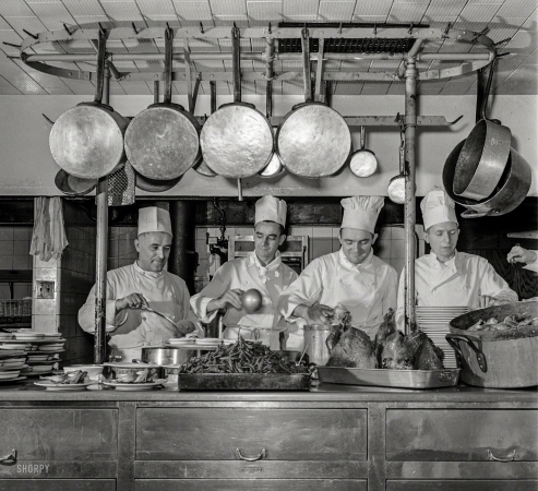 Photo showing: A Bird in the Pan -- January 1943. Chicago, Illinois. In the kitchen of one of the Fred Harvey restaurants at Union Station.