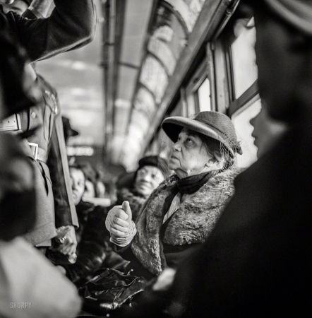 Photo showing: En Route -- March 1943. Washington, D.C. -- Riding on a streetcar.