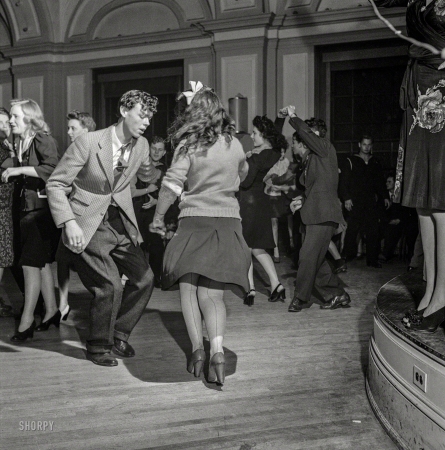 Photo showing: Flirty Dancing -- April 1943. Washington, D.C. Jitterbugs at an Elks Club dance, the 'cleanest dance in town'.