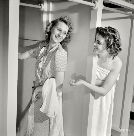 Photo showing: Pass the Soap -- June 1943. Arlington, Virginia. Girls in two of the long line of showers at Idaho Hall, Arlington Farms.