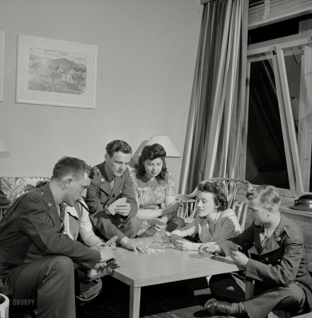 Photo showing: Night Moves -- June 1943. Arlington, Virginia. Girls entertaining their guests in one of the two card rooms
at a residence for the women who work in the U.S. government for the duration of the war.