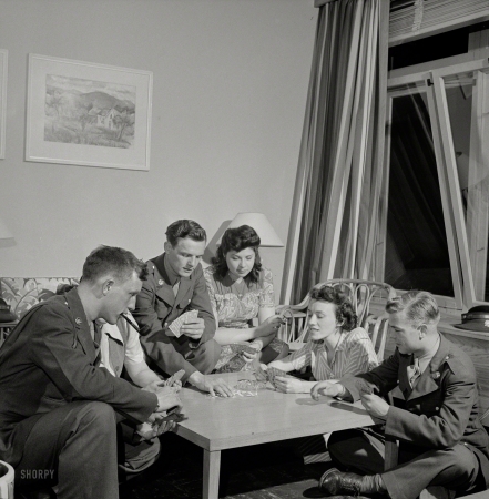 Photo showing: Night Moves -- June 1943. Arlington, Virginia. Girls entertaining their guests in one of the two card rooms
at a residence for the women who work in the U.S. government for the duration of the war.
