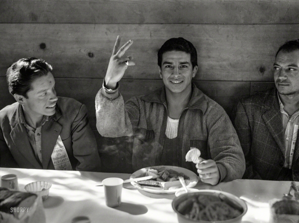 Photo showing: Trabajadores Mexicanos -- May 1943. Stockton, Calif. Mexican agricultural laborers who have come to help harvest beets eating their lunch.
