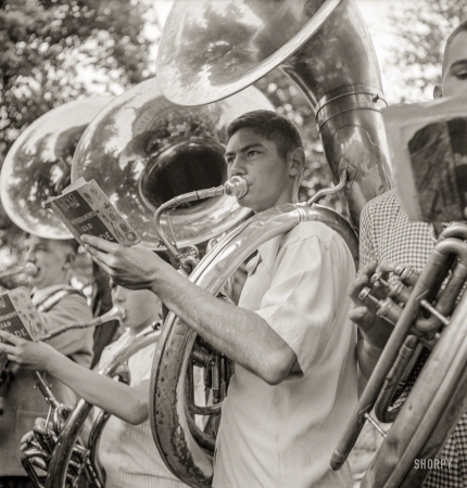 Photo showing: Top Brass -- May 31, 1943. Gallipolis, Ohio. Young horn player at the Decoration Day cere­monies.