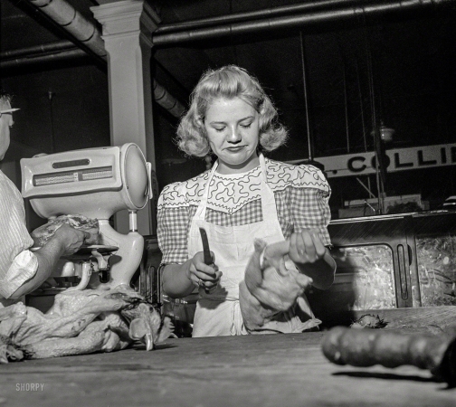 Photo showing: Betty the Butcher -- June 1943. Washington, D.C. Betty Jane Colbert, a worker at the Arcade butcher shop, dismembering a chicken.