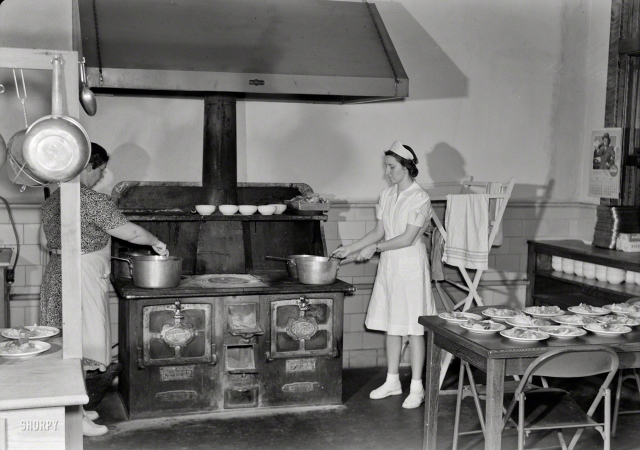 Photo showing: School Lunch -- May 1943. Keysville, Va. Randolph Henry High School cafeteria kitchen. Lunches cost about 15 cents.