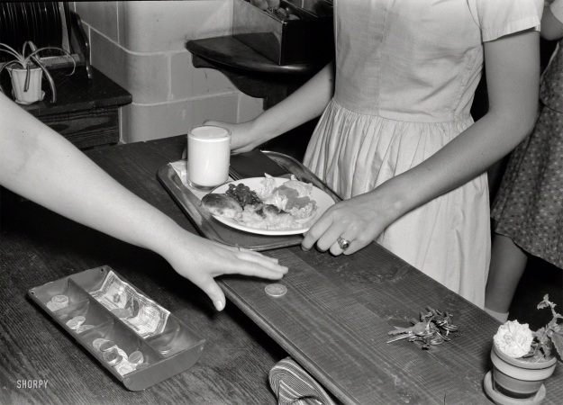 Photo showing: Cafeteria Cuisine -- May 1943. Keysville, Virginia. Randolph Henry High School cafeteria. Typical lunch for 15 cents:
Candied yams, macaroni and cheese, fruit salad, deviled eggs, dessert and milk. Milk is free.