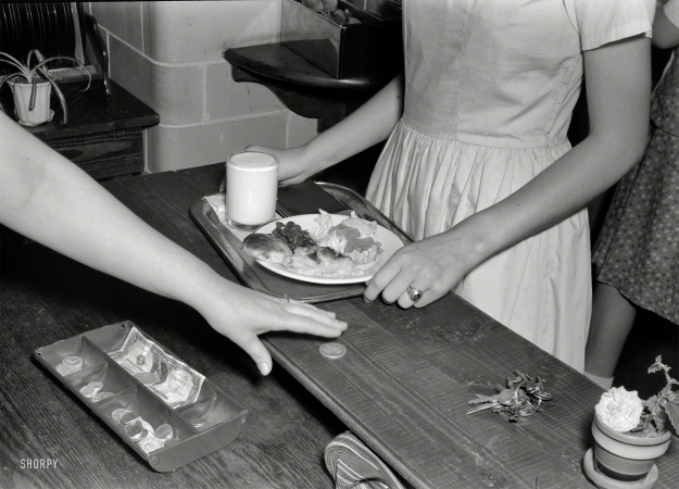 Photo showing: Cafeteria Cuisine -- May 1943. Keysville, Virginia. Randolph Henry High School cafeteria. Typical lunch for 15 cents:
Candied yams, macaroni and cheese, fruit salad, deviled eggs, dessert and milk. Milk is free.