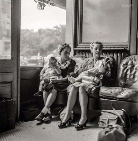 Photo showing: Tots in Transit -- September 1943. Washington Court House, Ohio. Mothers with their babies waiting at the Greyhound bus depot.