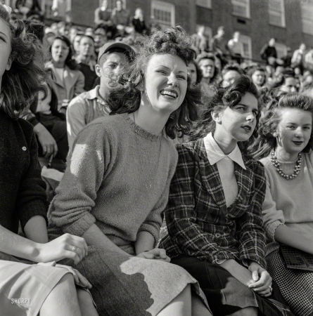 Photo showing: Sweater Weather -- October 1943. Washington, D.C. Football fans at Woodrow Wilson High School.