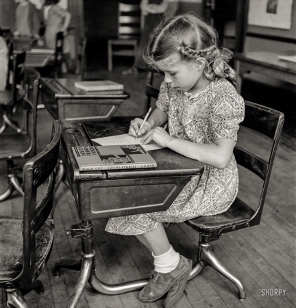 Photo showing: Textbook Example. -- May 1940. Southington, Connecticut. Schoolgirl studying.