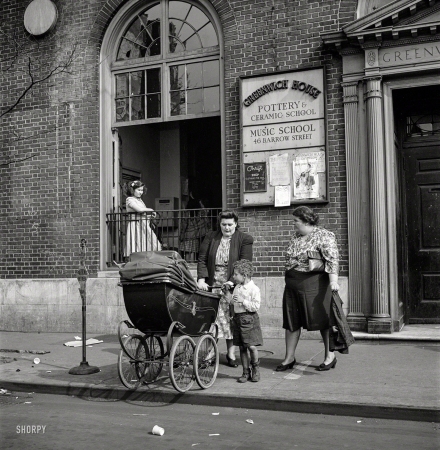 Photo showing: Working Moms -- May 1944. New York. Two working mothers calling for children at Greenwich House,
a neighborhood center, where they have left them early in the morning for day care. 