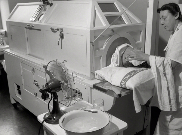 Photo showing: Fever Machine -- 1943. Melbourne, Australia. United States Army hospital. Patient receiving treatment in
new fever machine which keeps temperature at 107 degrees (108 degrees is fatal).