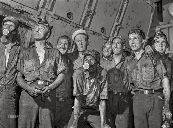 Photo showing: Boiler Bros -- July 1942. Hoffman Island, merchant marine training center off Staten Island.
Trainees aboard the training ship New York working in the boiler room.