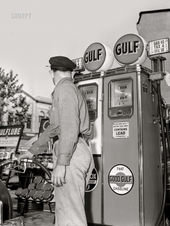 Photo showing: That Good Gulf -- Circa 1942. Our democratic way of sharing the limited amount
of gasoline means a new stance for the service station attendant.