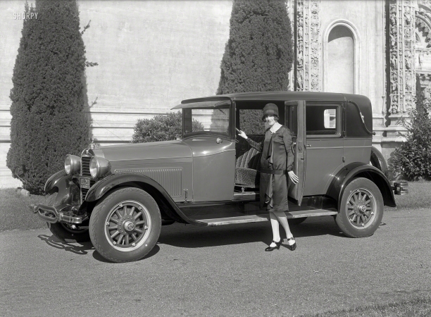 Photo showing: Modish Motorist -- San Francisco, 1927. Hudson sedan, palace grounds.