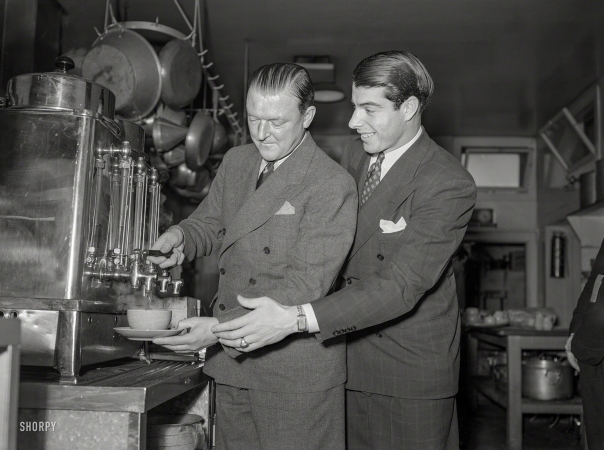 Photo showing: Cuppa Joe -- San Francisco circa 1940. Joe DiMaggio and friend pouring coffee in restaurant kitchen.