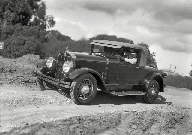 Photo showing: Making Tracks -- San Francisco, 1928. Franklin convertible coupe at Land's End, Presidio.