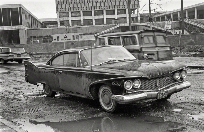 Photo showing: Plymosaurus Rex -- 1960 Plymouth Belvedere on Boston street, 1964.