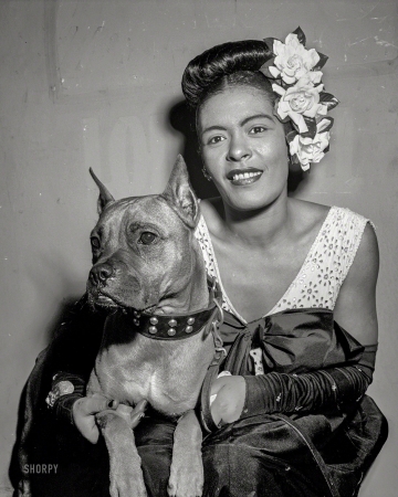 Photo showing: Lady and Mister -- New York circa 1947. Billie Holiday and her dog Mister at a 52nd Street jazz club.