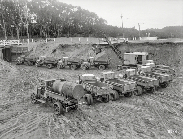 Photo showing: Construction Zone -- The San Francisco Bay Area circa 1931. Earth-moving equipment and trucks.