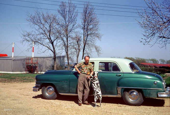 Photo showing: Sally and the DeSoto -- Hubert at Claude's farm -- April 27, 1952.