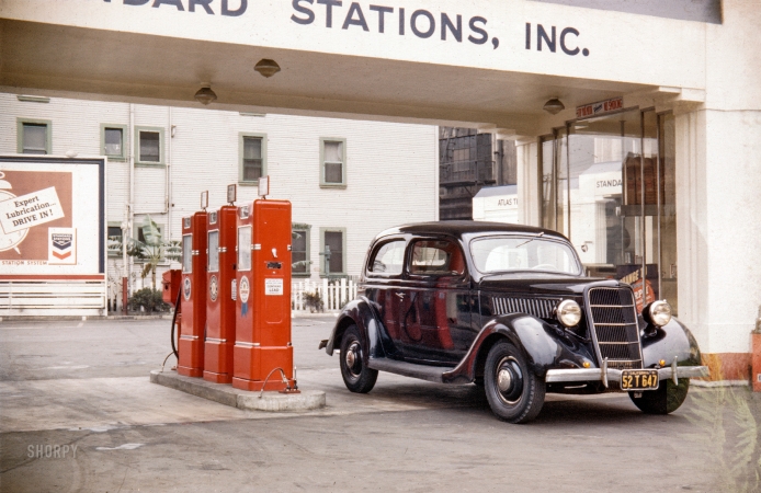 Photo showing: Western Standard: 1941 -- 1935 Ford Tudor sedan at gas station.