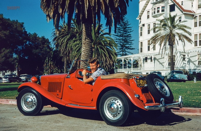 Photo showing: Muy Caliente: 1953 -- Don Cox in a Tabasco-red MG at the Hotel Del Coronado in San Diego.