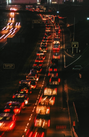 Photo showing: Night Ride Home -- February 1969. Night Traffic. Oceanside from the San Diego Freeway.