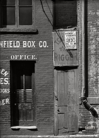 Photo showing: Box Office -- Circa 1893-1899. Doorways to two businesses, New York City.