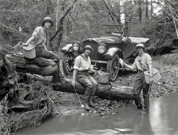 Photo showing: Studebanglers -- The Bay Area circa 1919. Girls fishing next to Studebaker 'Big Six' touring car.