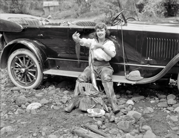 Photo showing: Hooked -- The Bay Area circa 1919. Angler next to Studebaker 'Big Six' touring car.