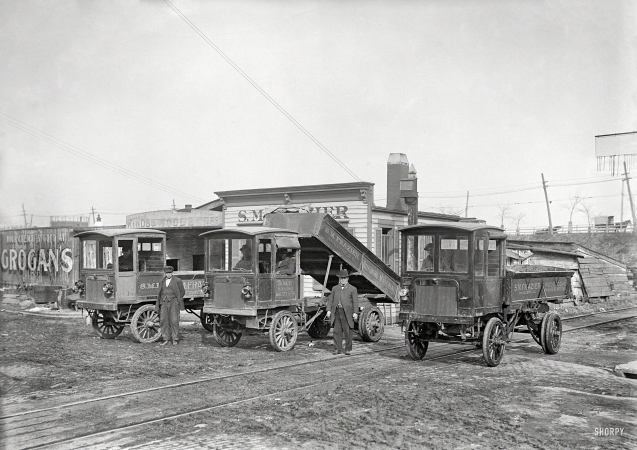 Photo showing: Wood and Coal -- Washington, D.C., circa 1912. Samuel Frazier, dealer in coke and lime, and his fleet of Wilcox Trux.