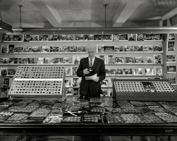 Photo showing: Look Here -- April 4, 1958. Dan D. Mich, Look magazine editorial director.
