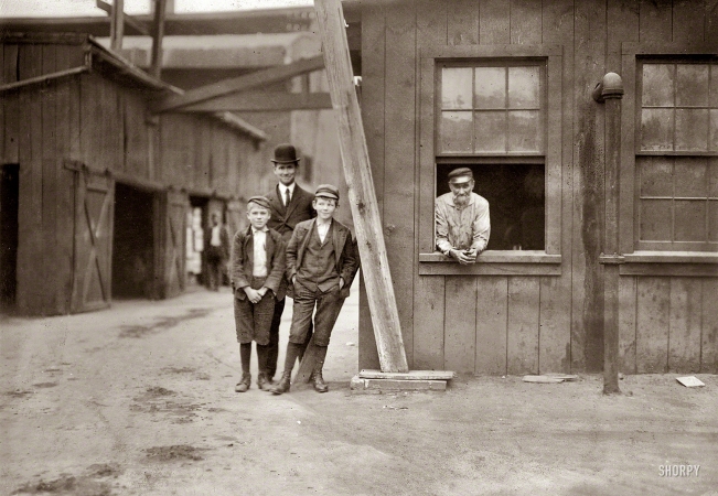 Photo showing: Industrious George -- November 1909. Cumberland Glass Works, Bridgeton, N.J. Smallest boy is George Cartwright, 401 N. Laurel St.