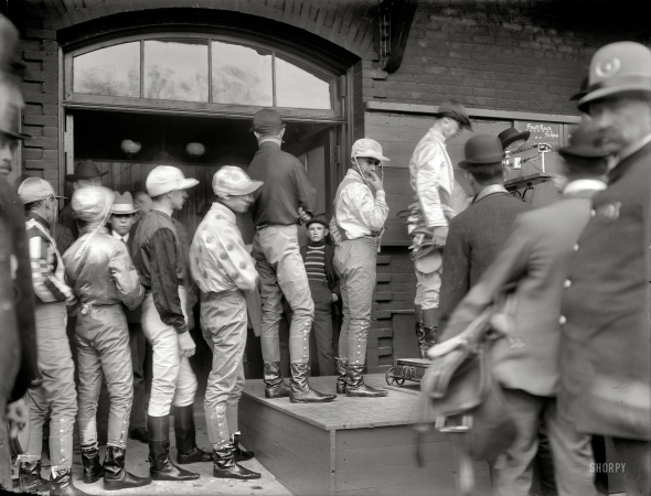 Photo showing: Weighing the Jockeys -- New York circa 1908. Racing -- weighing the jockeys.