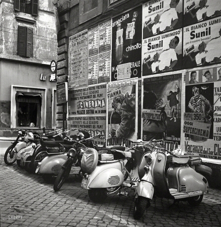 Photo showing: La Dolce Vespa -- Rome, Italy, 1955. Vespa motor scooters.