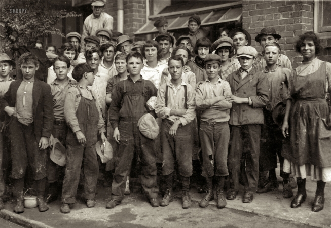 Photo showing: Lane Mill -- November 1913. Group of workers in Lane Cotton Mill showing the youngest workers and typical of conditions in New Orleans.