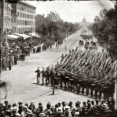 Photo showing: Army of Georgia -- May 24, 1865. Washington, District of Columbia. The Grand Review of the Army.
Units of XX Army Corps, Army of Georgia, passing on Pennsylvania Avenue near the Treasury.