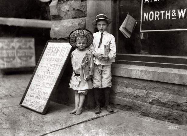 Photo showing: Summer Intern -- June 1911. Norfolk, Va. Gus Hodges, age 11, instructing his brother Julius, age 5.